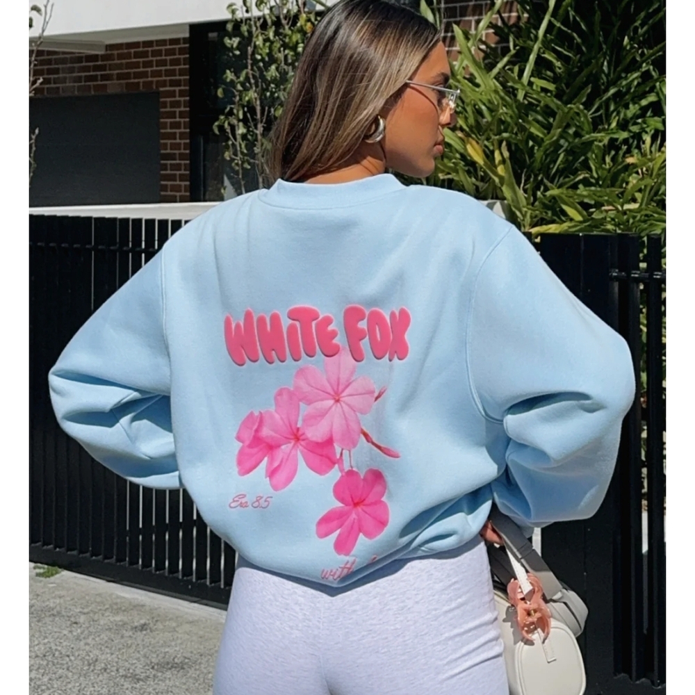 White Fox Boutique Light Blue Sweatshirt with Pink Floral Design
